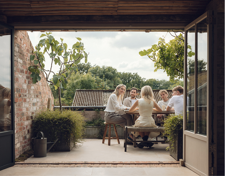The Annabelle & Co team gathered on a courtyard terrace
